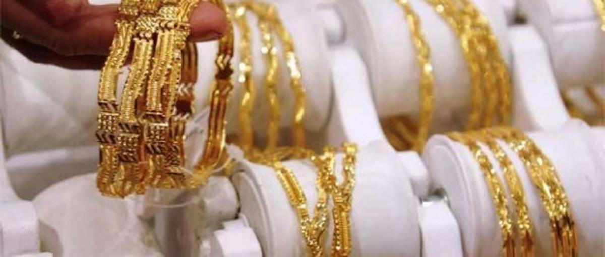 Gold eyes worst week in two months on US rate hike view